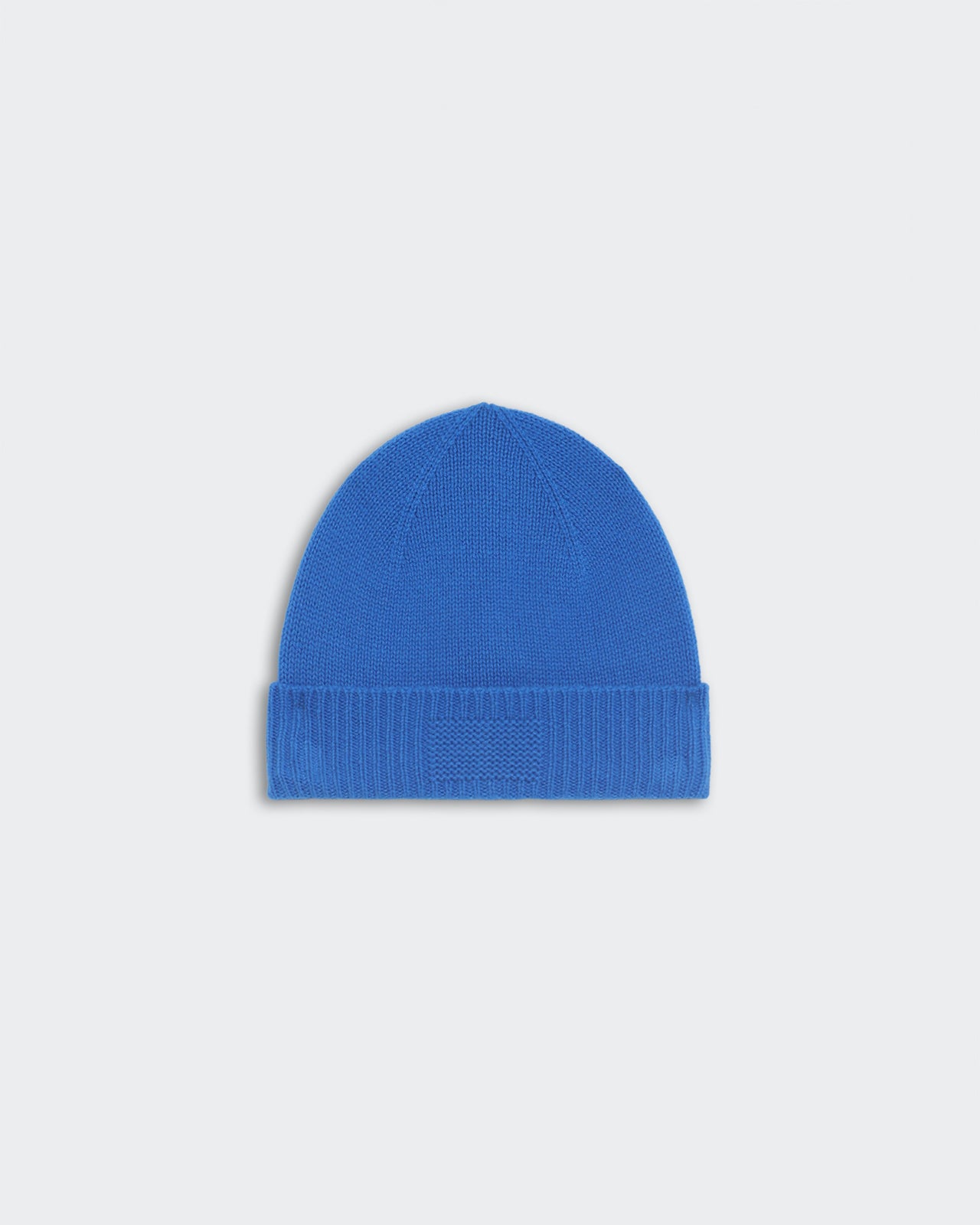 Blue rib cuff beanie made of 100% premium cashmere with signature GIR branding on the cuff trim