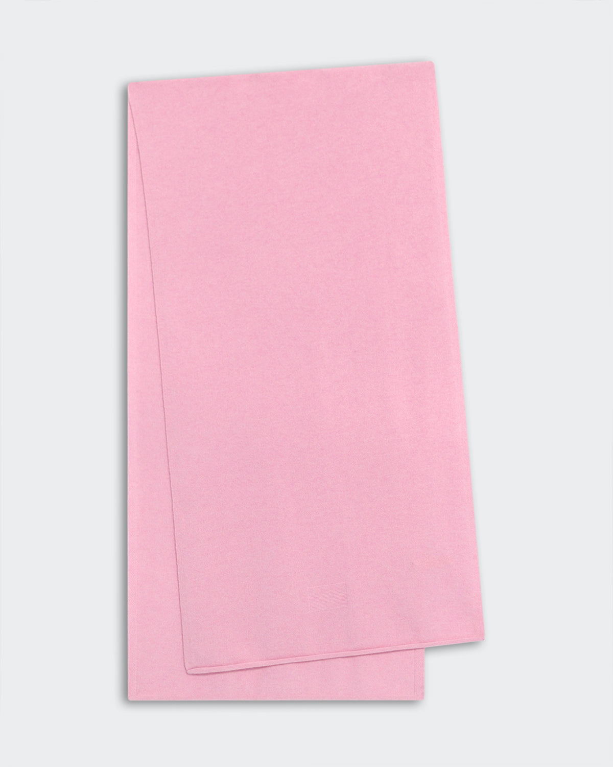 Light-weight pink cashmere scarf with jersey roll hem, measuring 74 by 19 inches, made from 100% premium inner Mongolian cashmere.