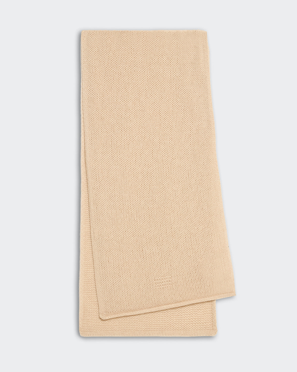 Folded sandstone-colored open knit jersey scarf made from 100% premium cashmere, lightweight and chunky design