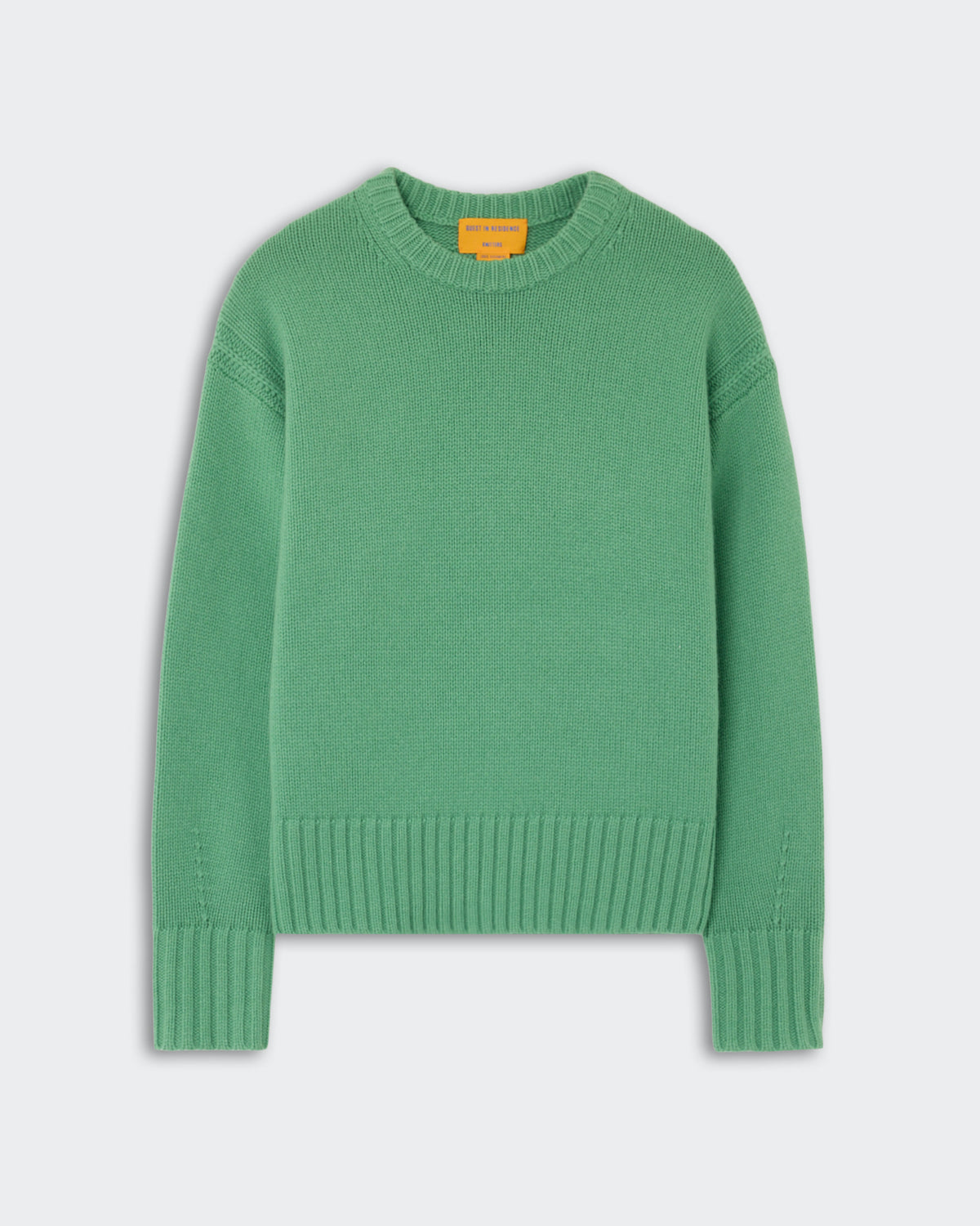 Green knitted long-sleeve sweater with a ribbed crew neckline, cuffs, and hem laid flat on a light background.