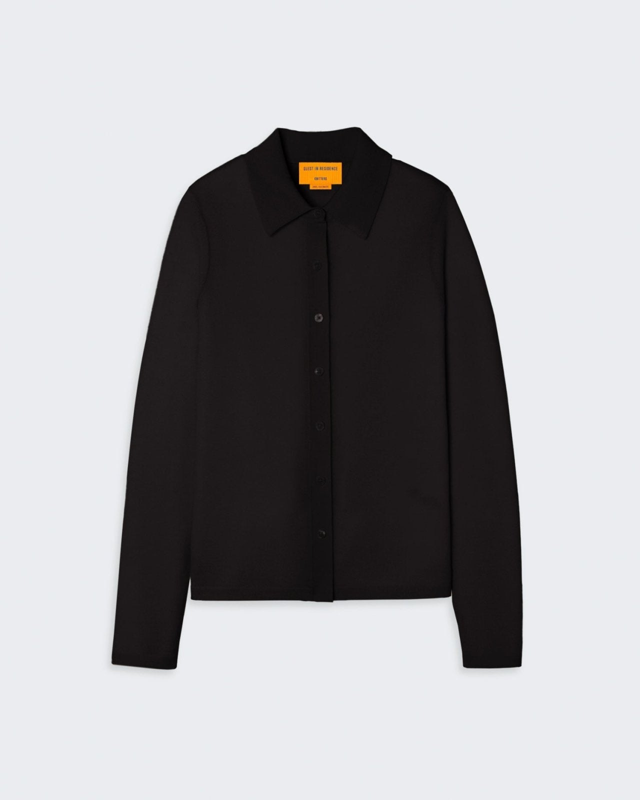 Woman's black button-down cashmere shirt.