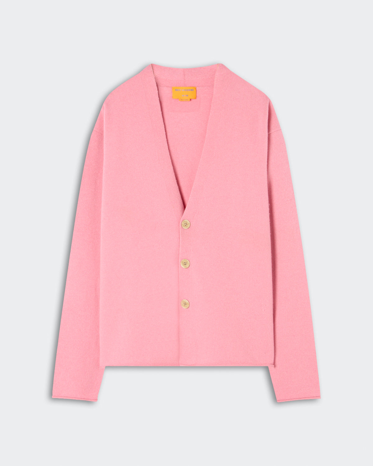 Everywear Cardigan - Sprinkle in a soft pink shade, crafted from cozy cashmere with a relaxed fit, featuring a V-neck and three natural buttons for a simple closure.