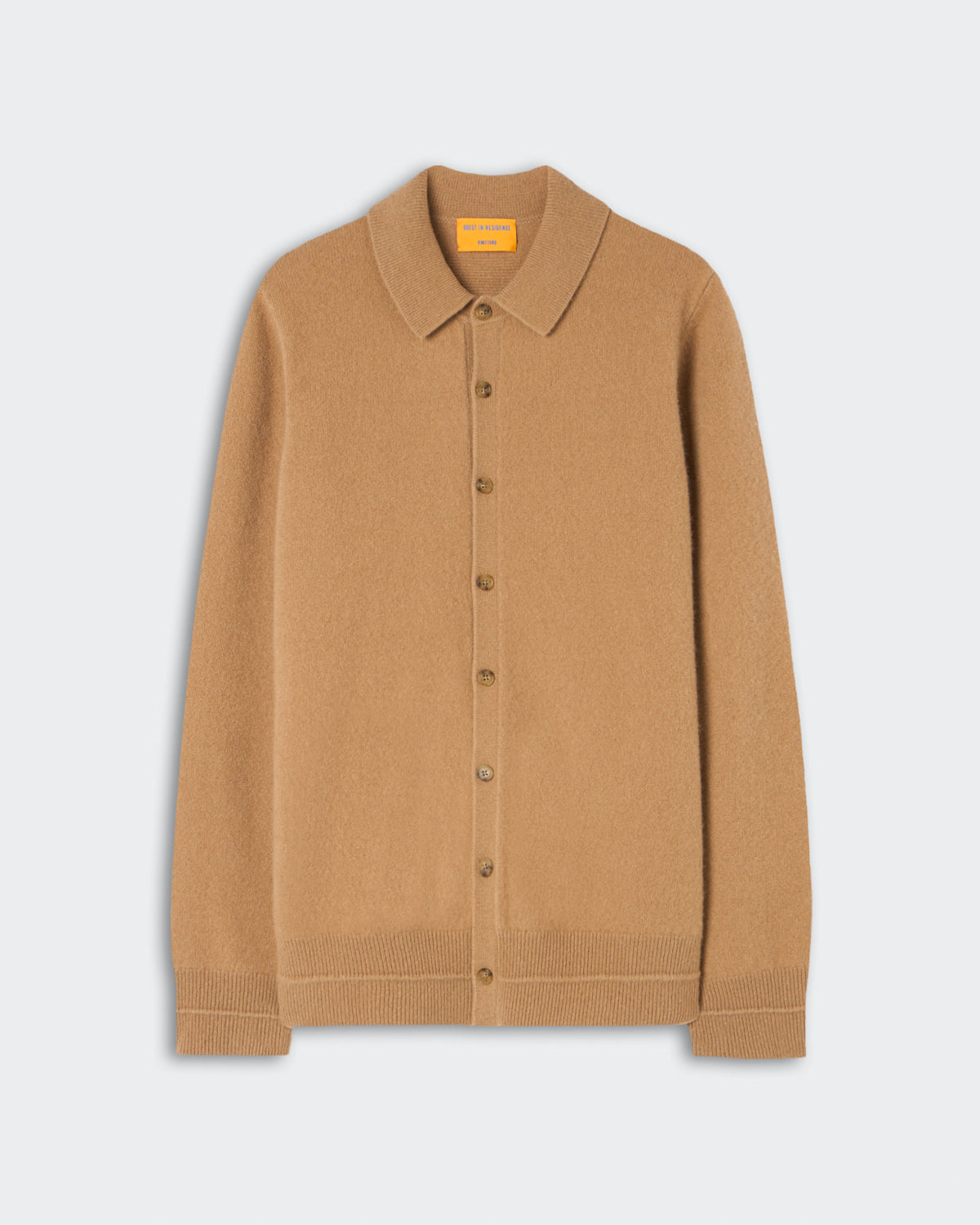 Light brown button-up cardigan with a classic collar and ribbed cuffs and hem, made of soft cashmere fabric, displayed on a plain light background.