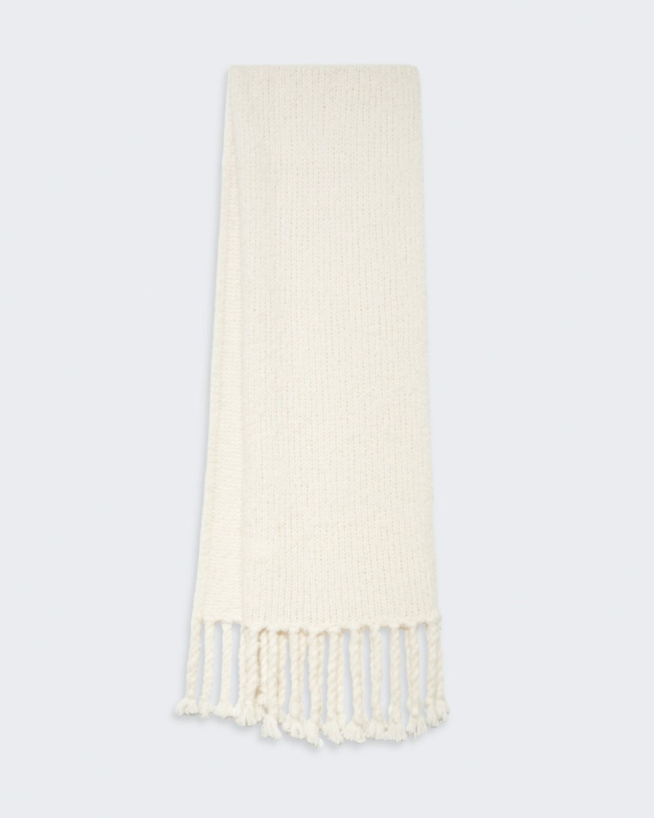 Cream-colored knit scarf with tassels