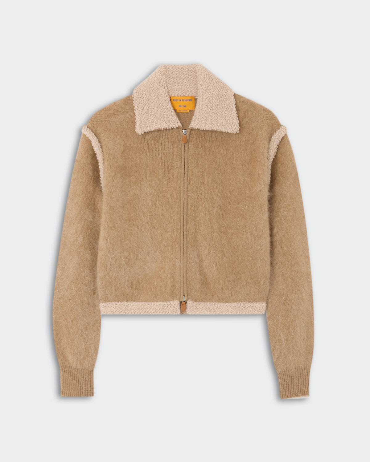 Light brown zip-up jacket with a contrasting textured collar, cuffs, and hem, displayed flat on a light gray background.