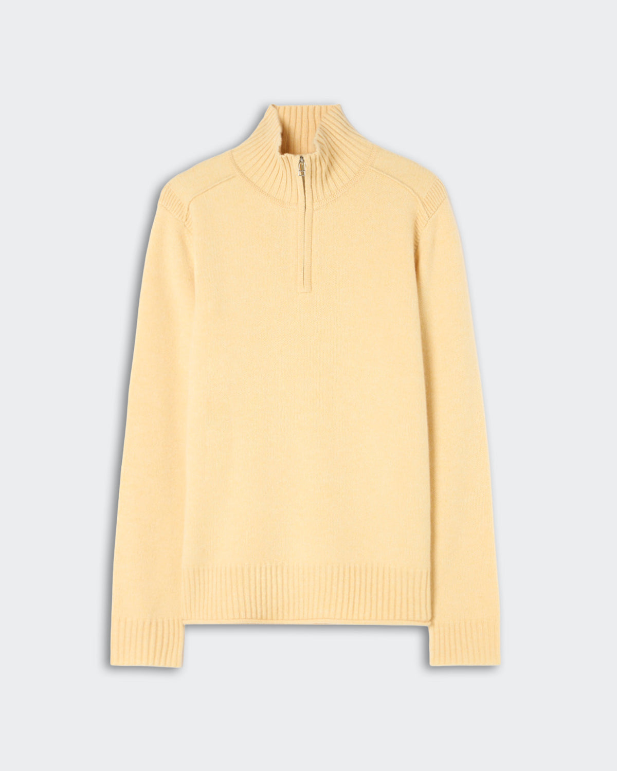 Light beige half-zip sweater with ribbed collar, cuffs, and hem, displayed on a plain light gray background.