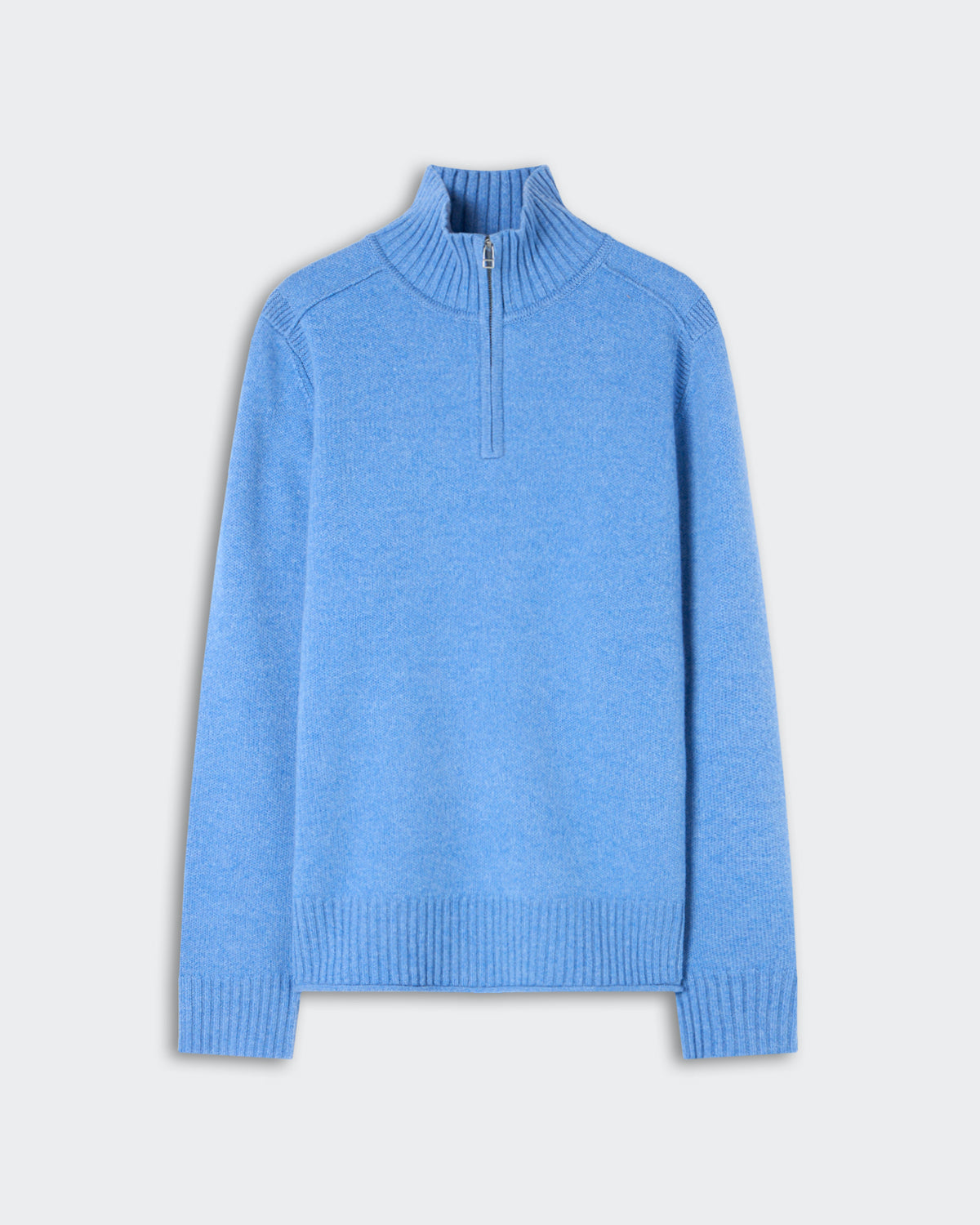 Light blue cashmere half-zip sweater with ribbed collar, cuffs, and hem displayed against a plain light gray background.