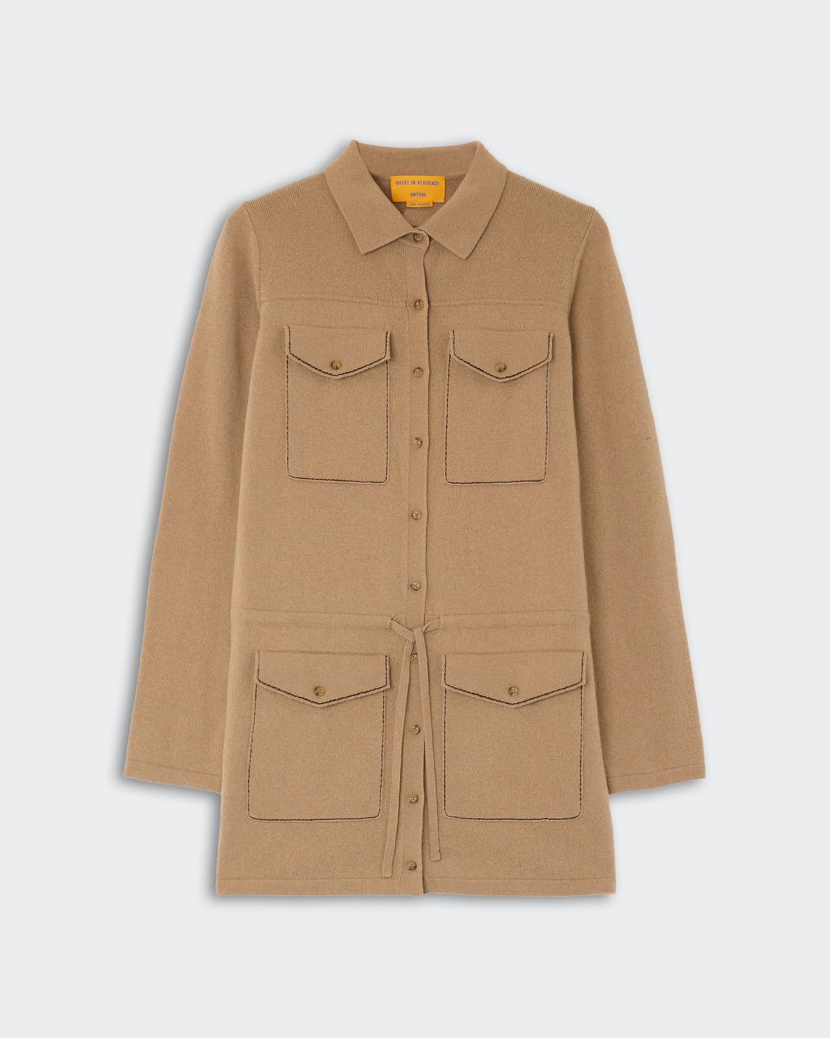 Industry Mini Dress - Camel in a soft camel color featuring a button-down front, four flap pockets with buttons, and a waist tie for a tailored silhouette.
