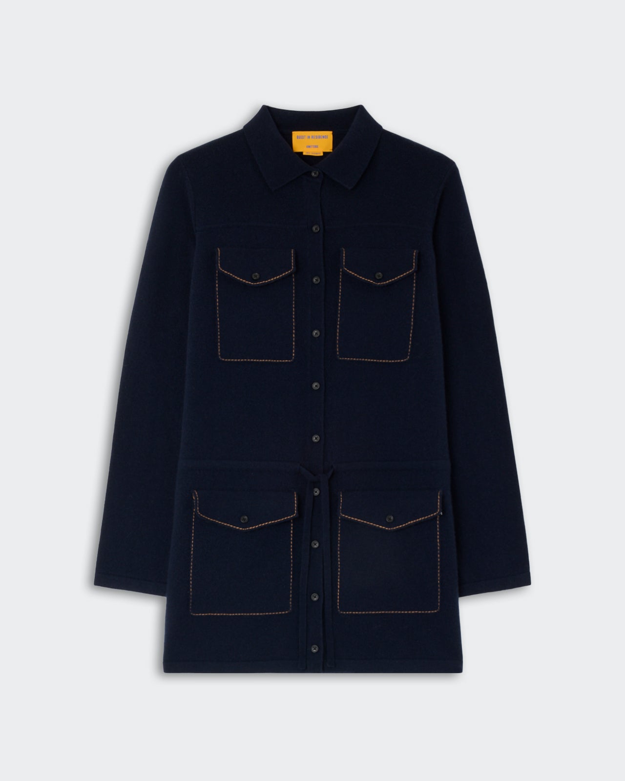 Industry Mini Dress - Midnight in a dark navy blue color with long sleeves, button-down front, collar, and four flap pockets featuring contrasting stitching.
