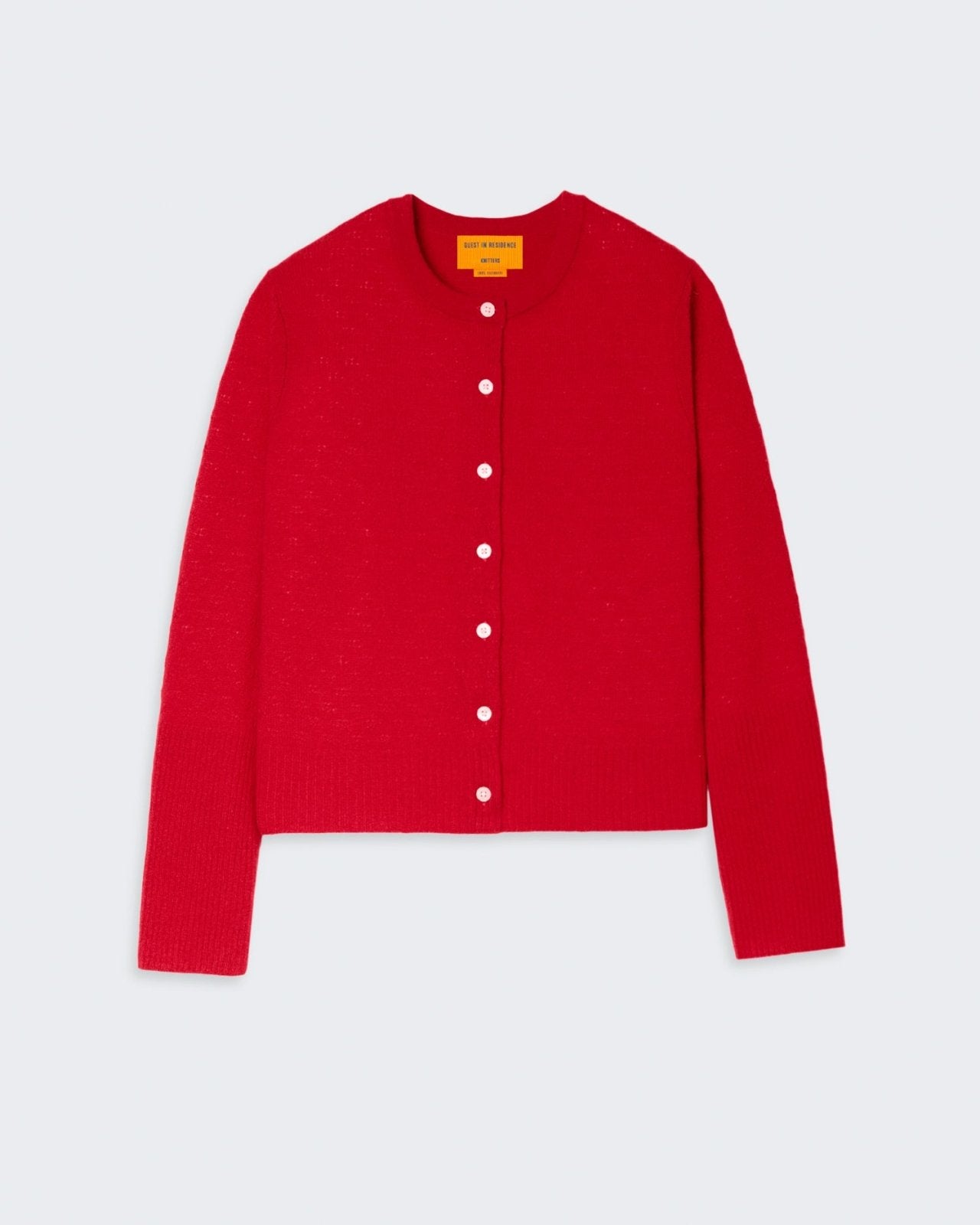 Elegant red cashmere cardigan with pointelle knit detail, crew neck, and button front closure.