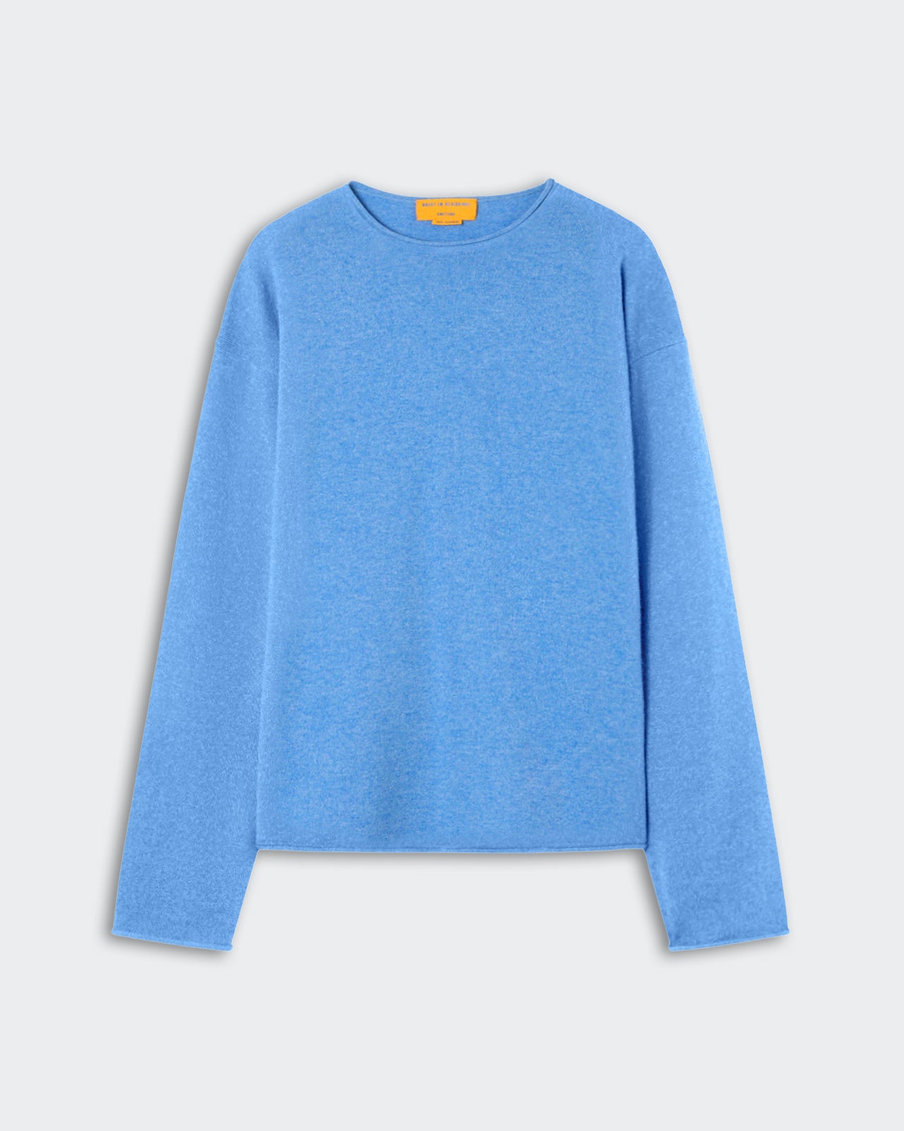 Light blue long-sleeve crew neck sweater with soft texture laid flat on a light gray background.