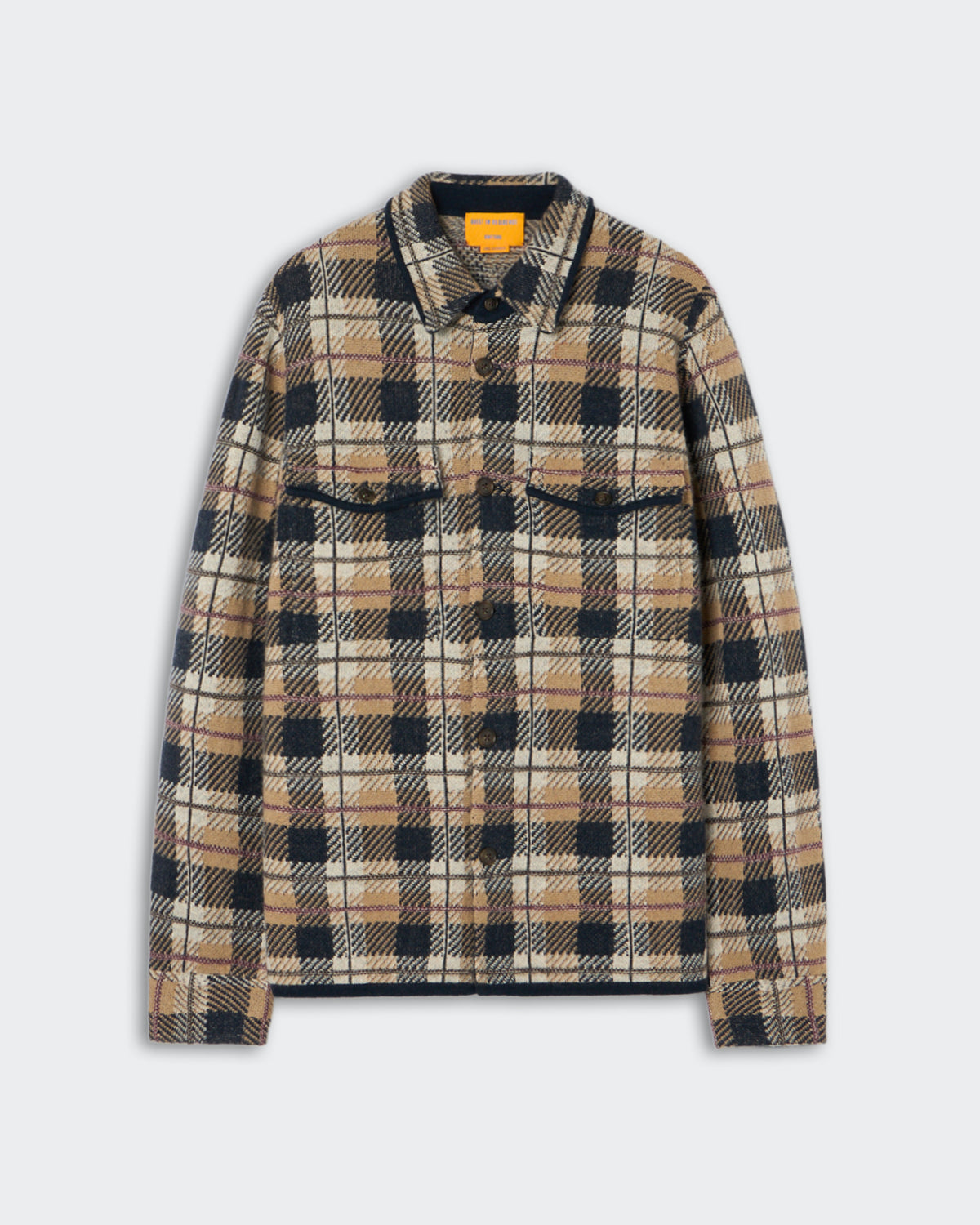 Beige, black, and white plaid long-sleeve button-up shirt with chest pockets and a pointed collar, displayed on a light gray background.