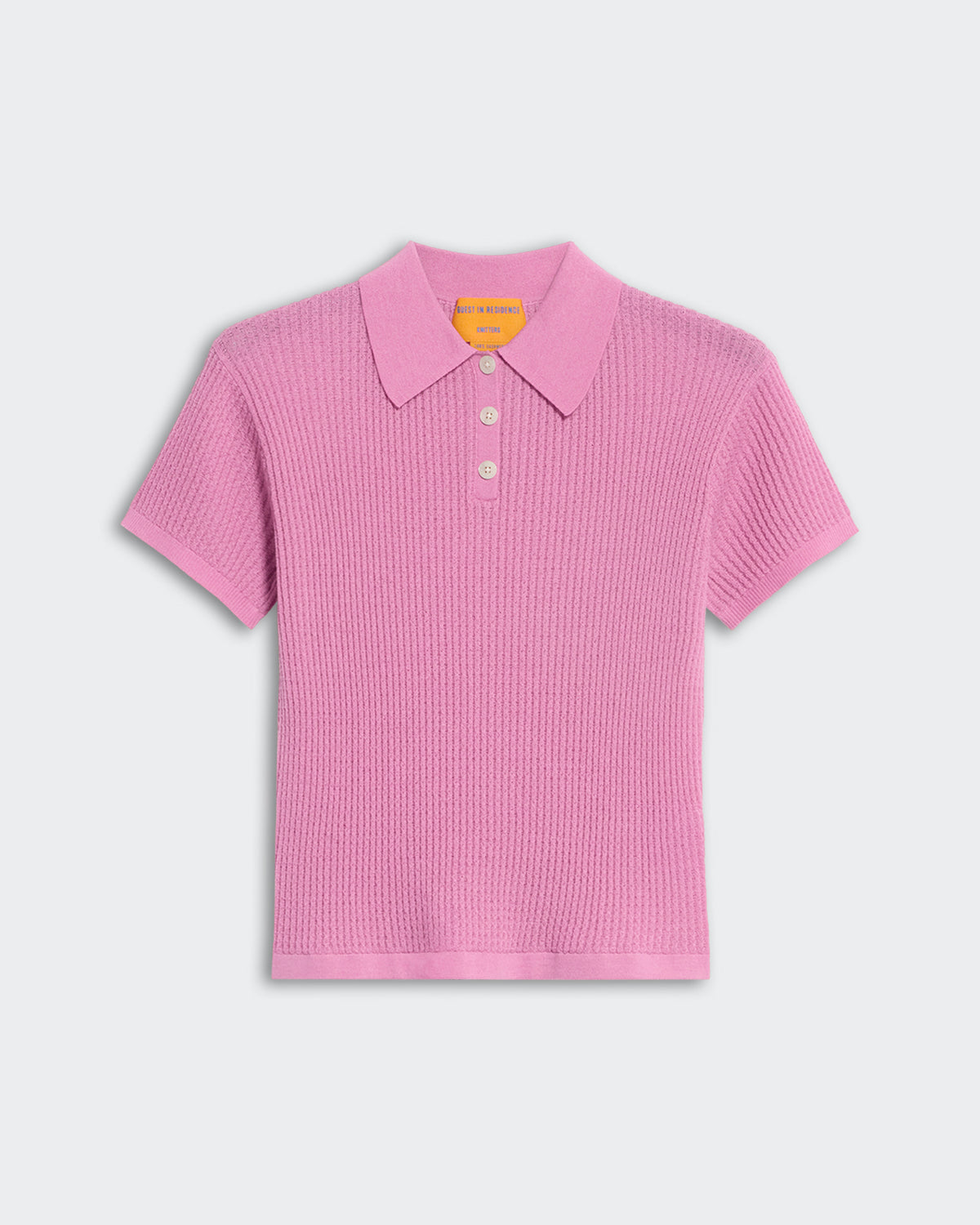 Lightweight rose pink women's polo shirt with textured waffle knit and three-button placket in cashmere