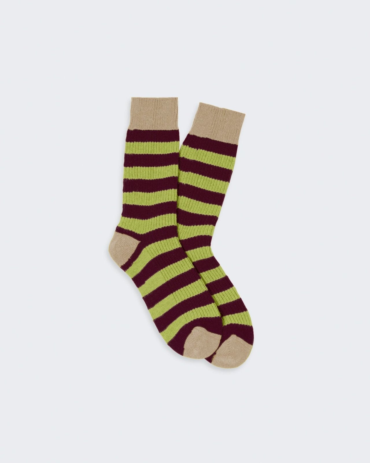 Striped socks in neutral and bold colors, intended for casual indoor wear.