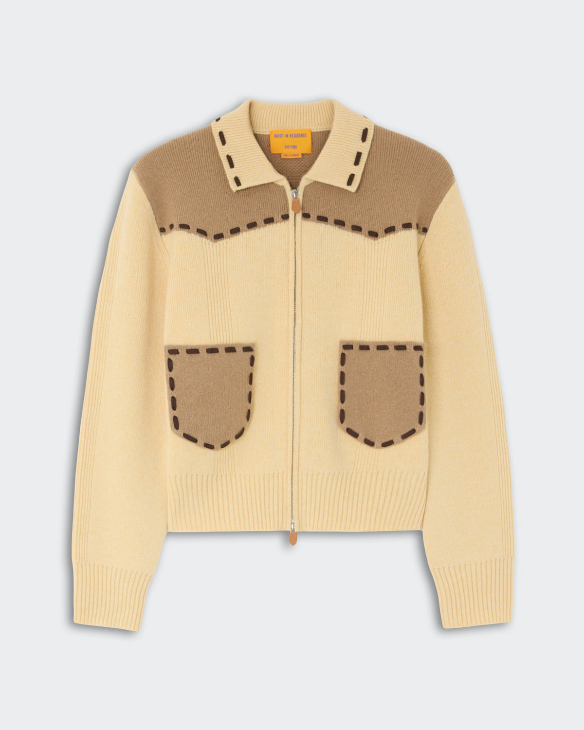 Saddle Up! Jacket - Butter/Camel featuring a zip-up front, camel color accents at the shoulders and pockets, butterfly collar, and ribbed cuffs, made from soft knit material.