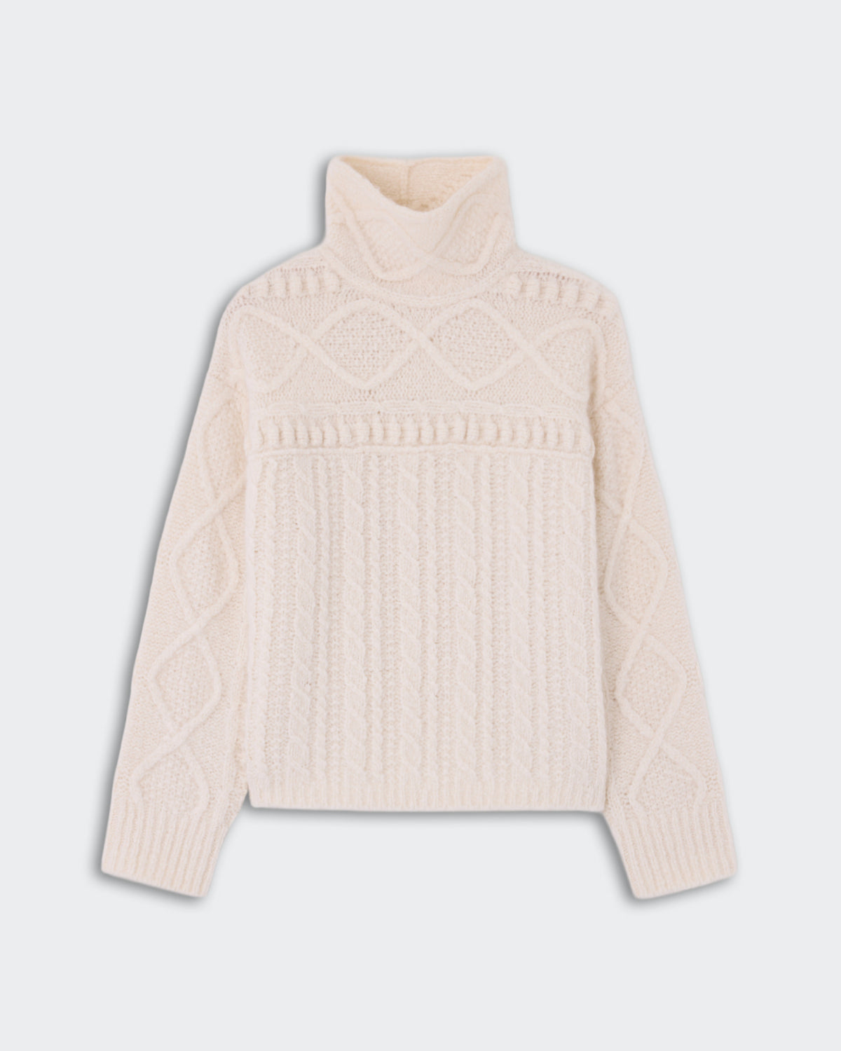 Cream-colored cable knit turtleneck sweater with intricate diamond and braided patterns, displayed flat on a light background.