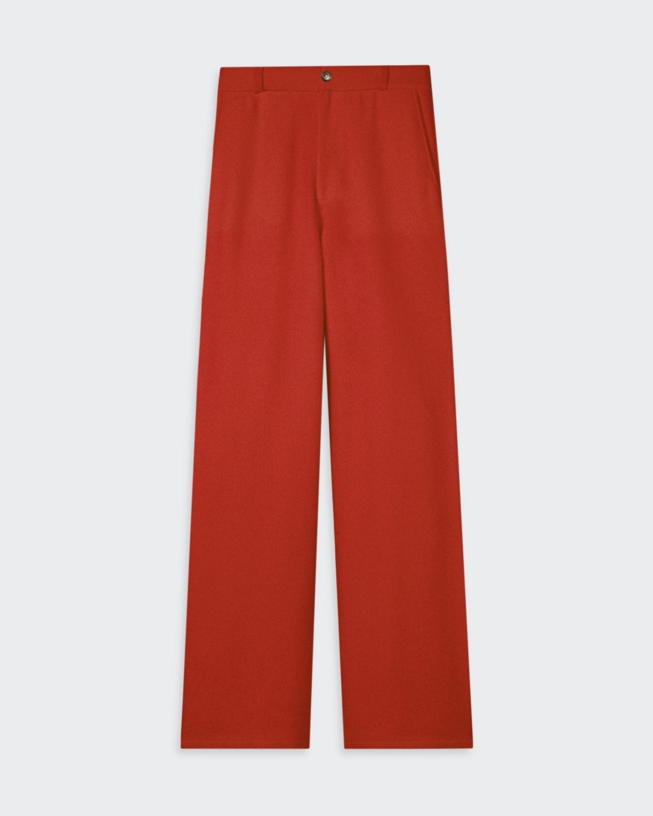 Women's tailored trousers in a rich chai color featuring a fly front closure, elasticized waistband, belt loops, and faux pocket detail at the back.