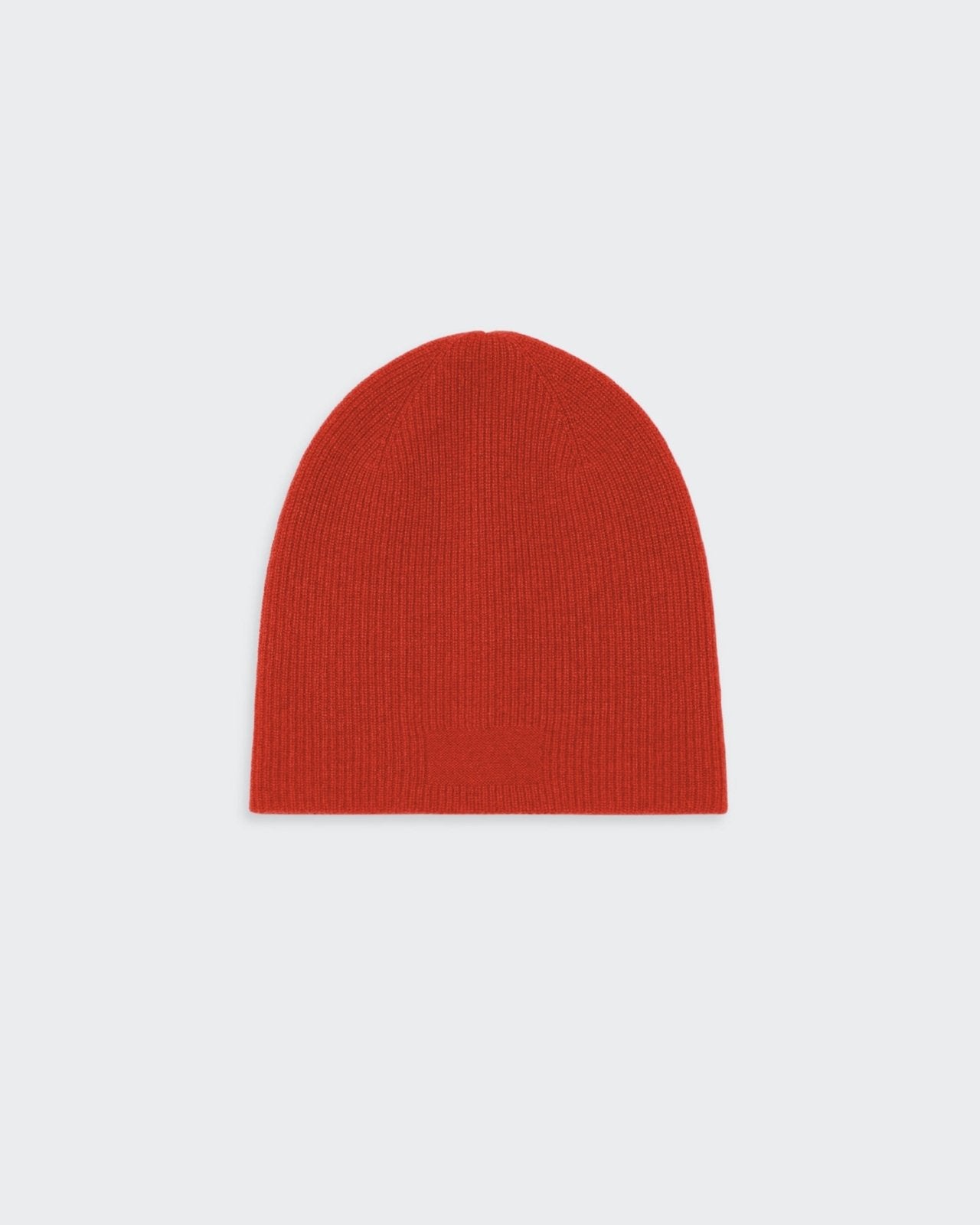 Unisex reversible cashmere beanie hat in red and black colors.