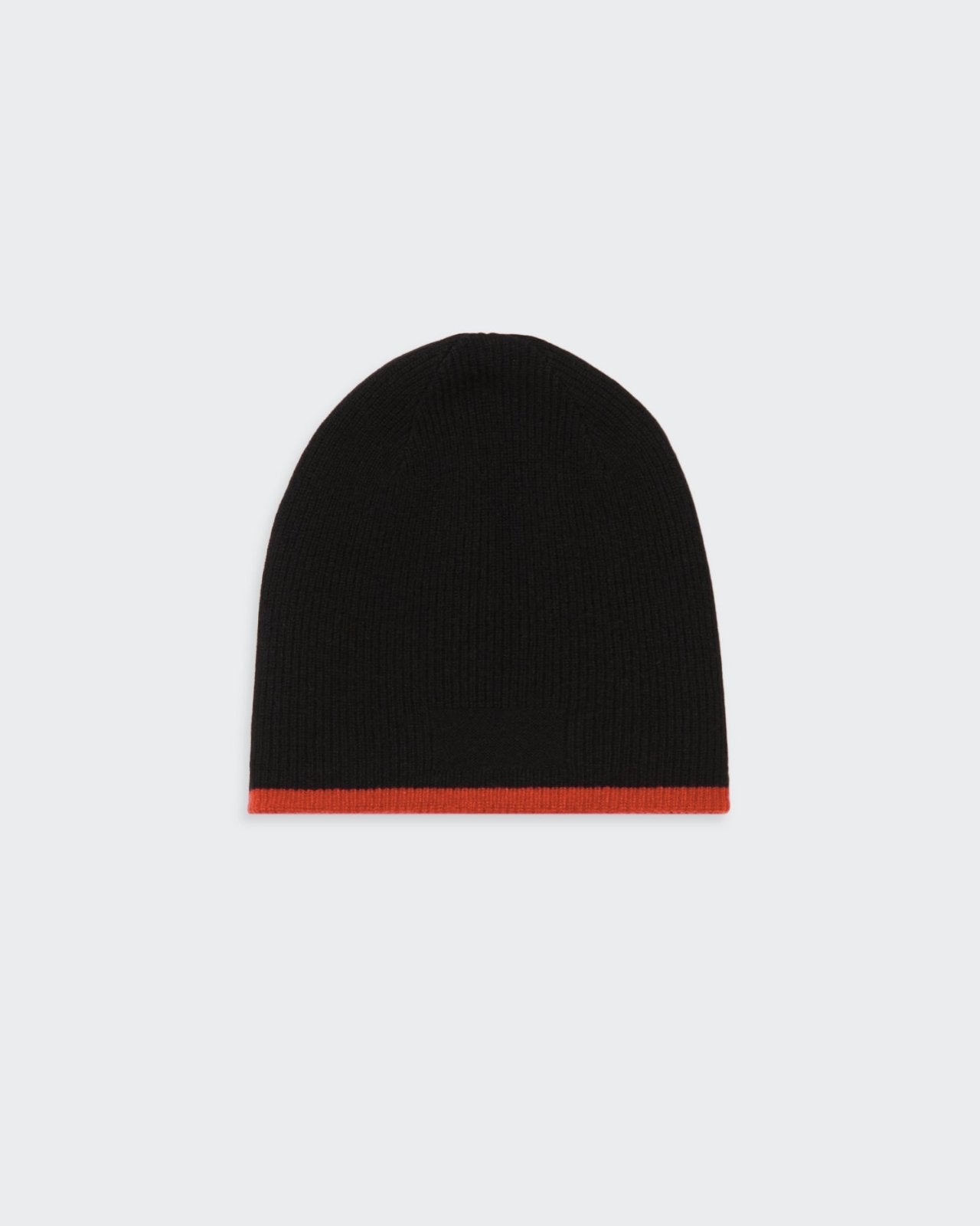 Reversible black and chai-colored cashmere beanie hat.