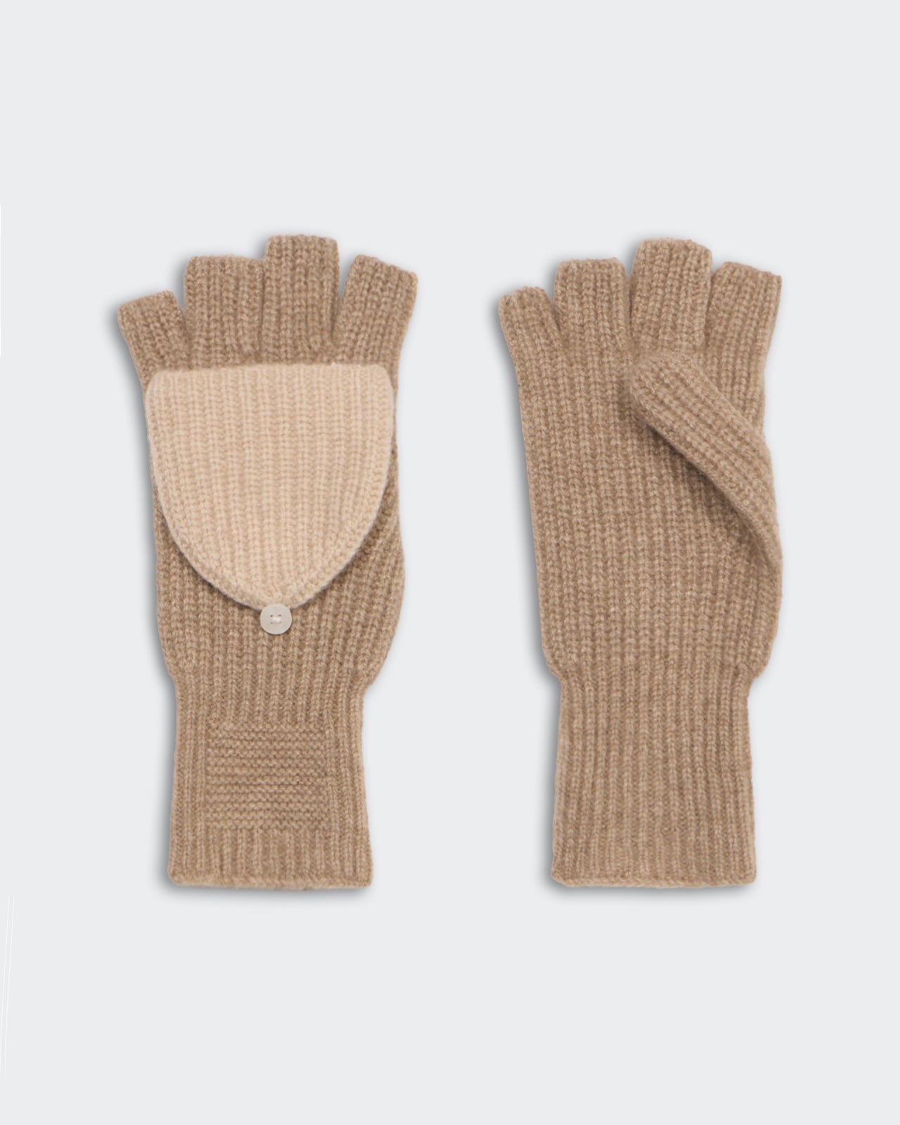 Taupe and sandstone mid-weight rib knit cashmere mitts with pull-on design and button-secured finger flap.