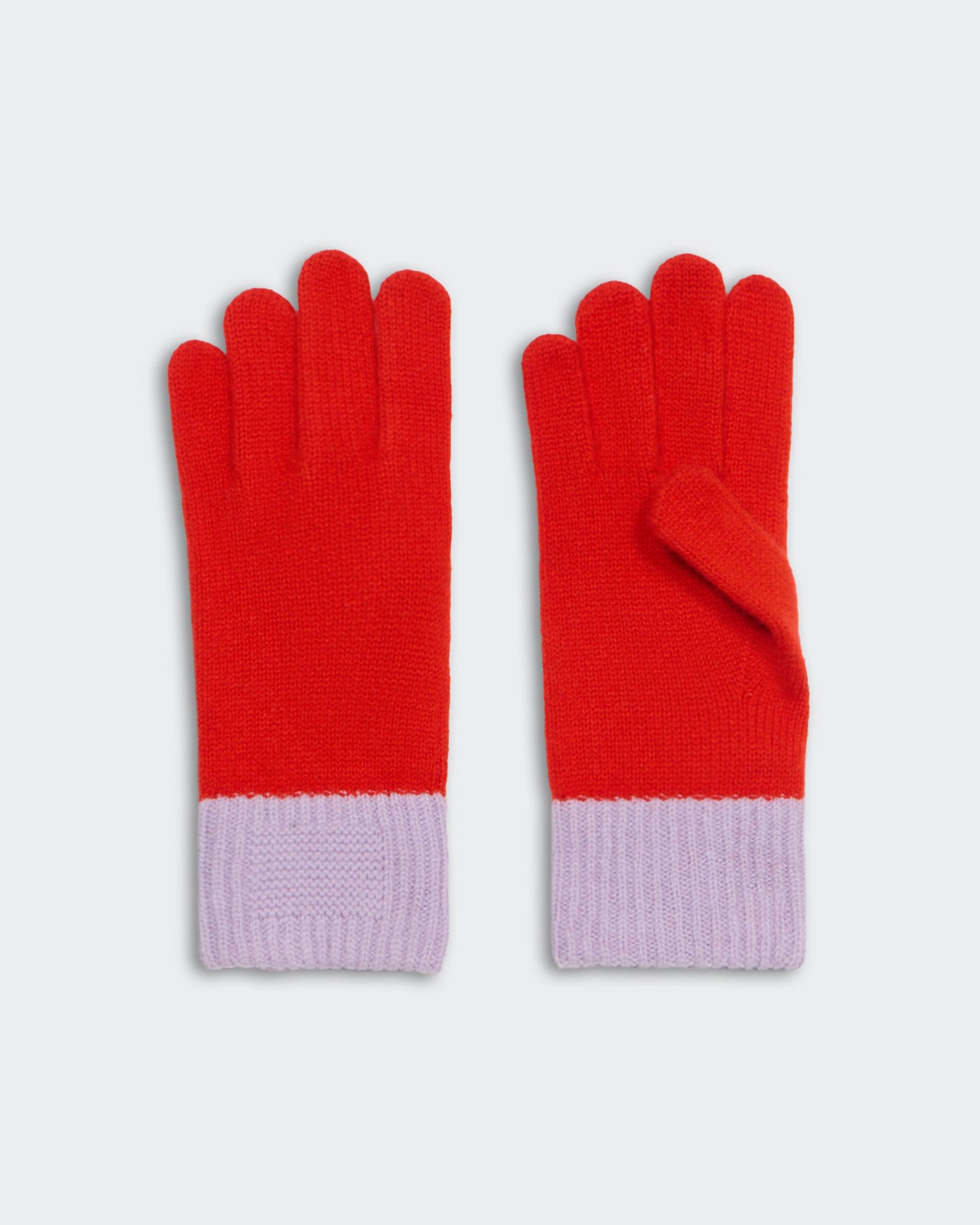 Pair of soft knit gloves in bright chili red with dusk purple cuffs, perfect for cozy winter wear