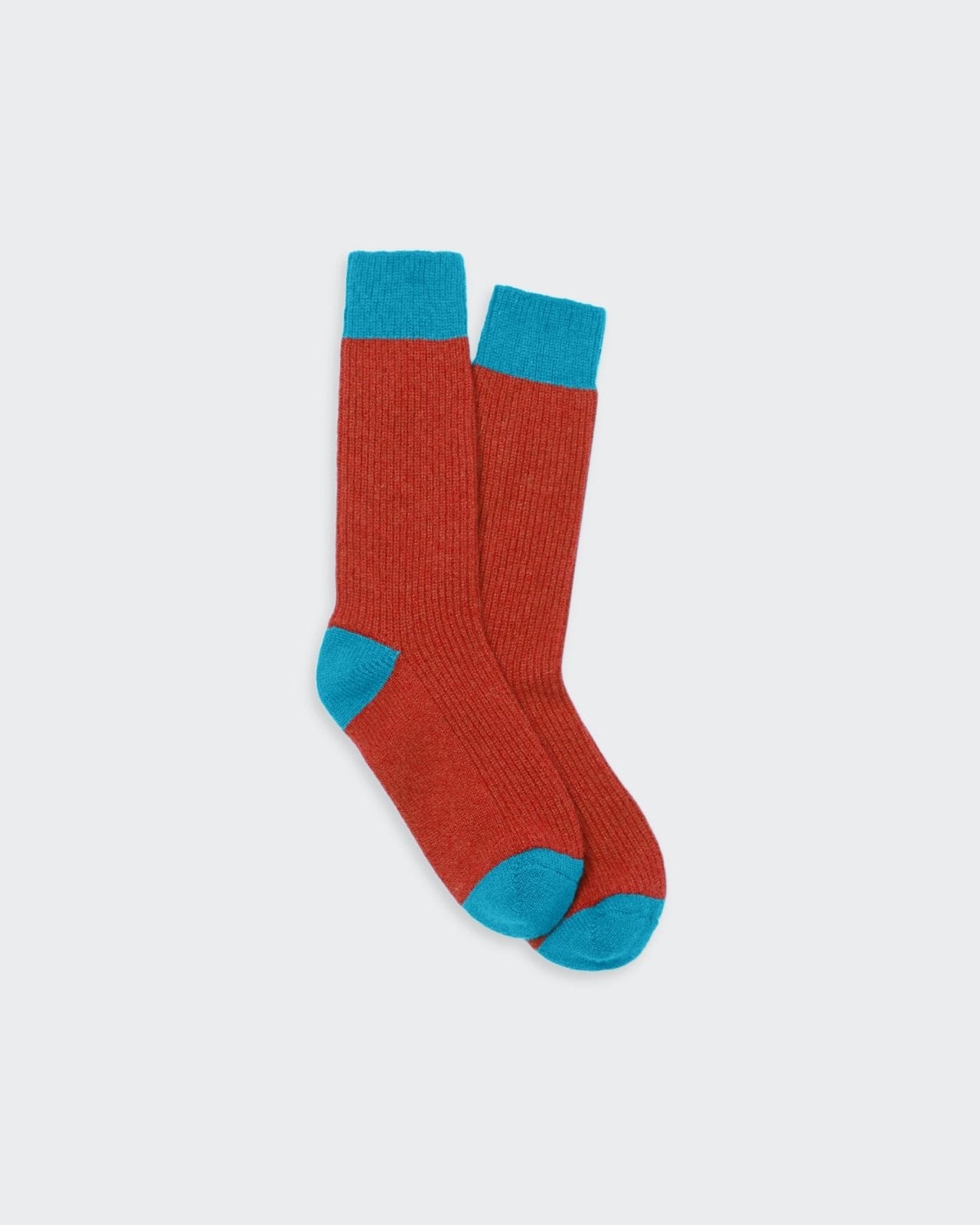 Unisex casual socks featuring a contrast color-blocking design in warm hues of orange and teal.