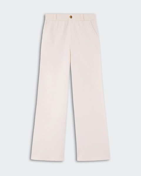 Light beige wide-leg pants with front pockets, a button and zip closure, displayed on a plain light background.