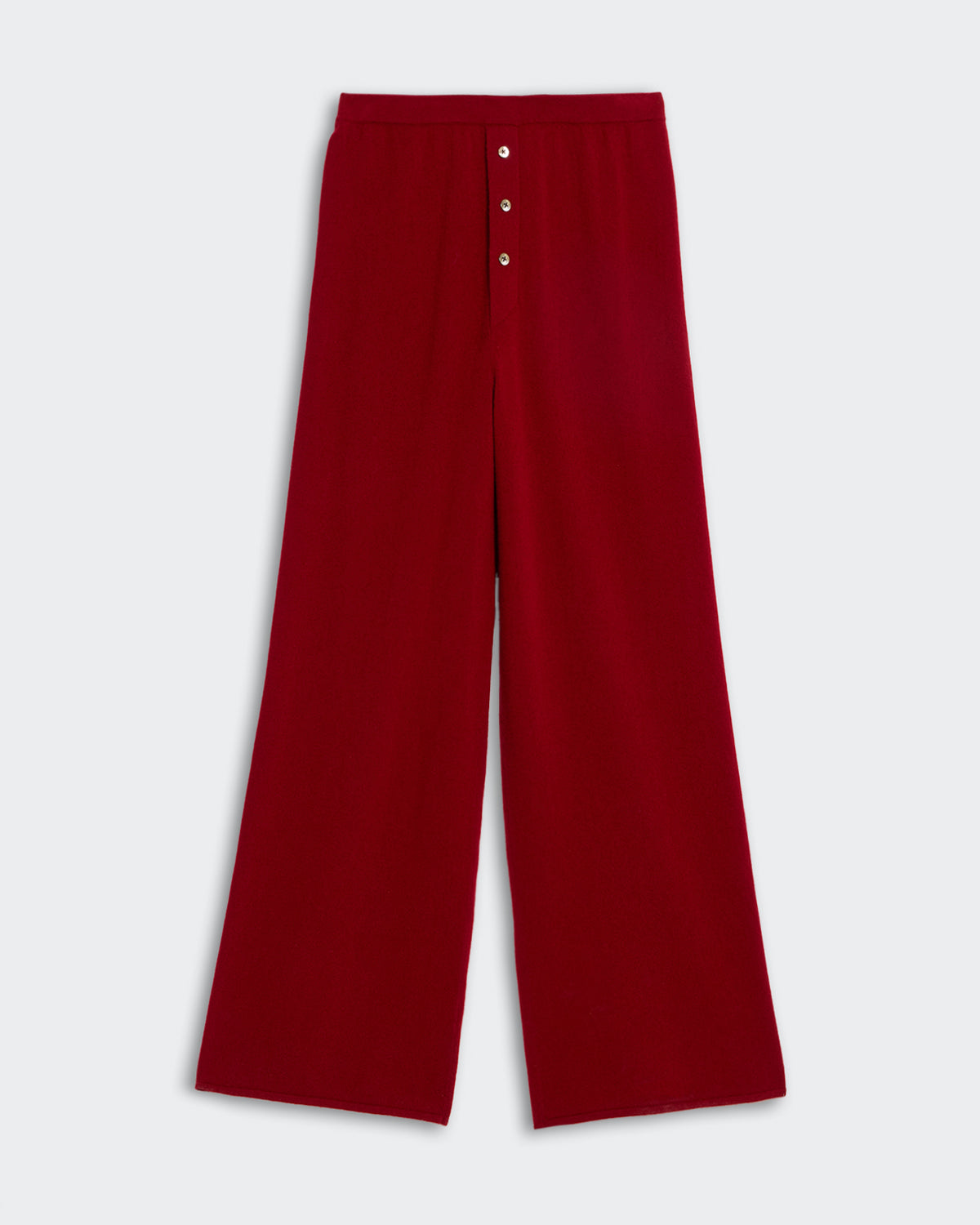 Everywear Pant - Ruby in deep red with wide legs and button detailing on the front waistband.