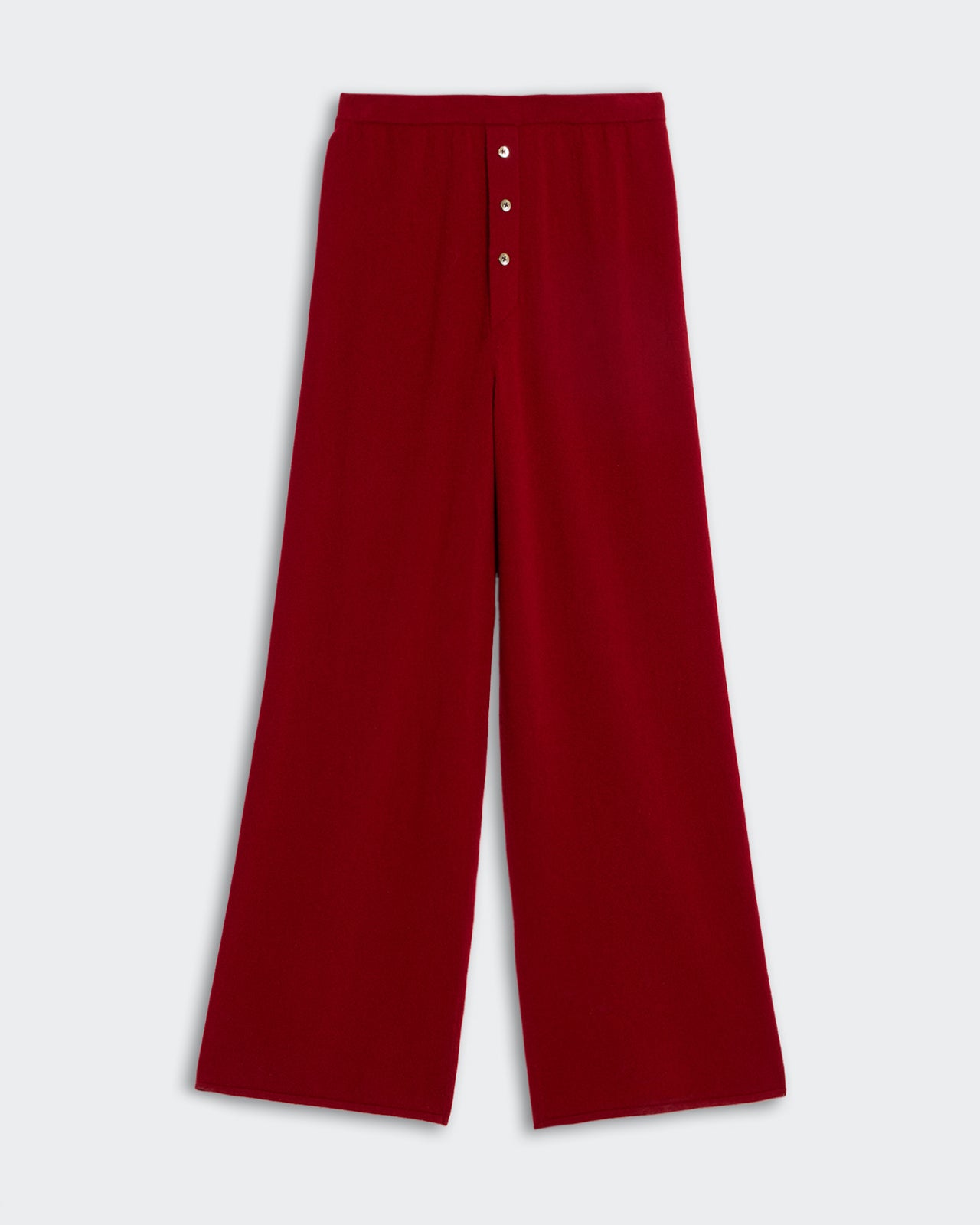 Everywear Pant - Ruby in deep red with wide legs and button detailing on the front waistband.