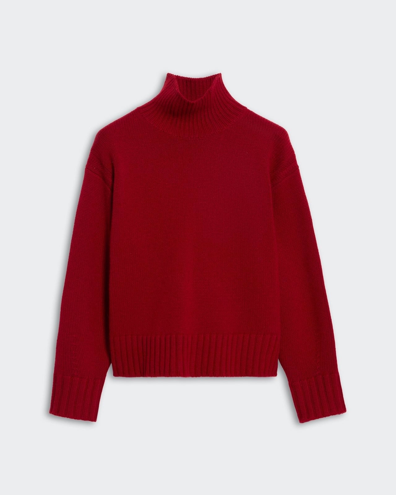 Cozy Turtleneck Ruby in deep red with ribbed high neck, cuffs, and hem, perfect for warm and stylish layering.