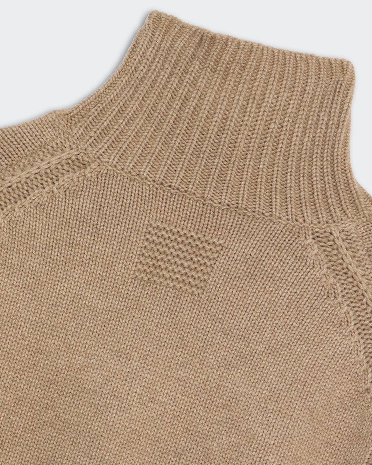 Cozy Turtleneck - Taupe close-up showing soft knit fabric and ribbed high collar detail.