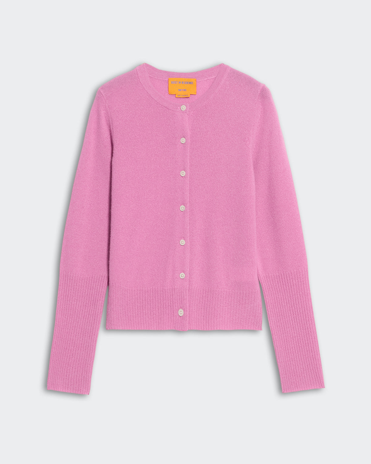 Light-weight rose pink cashmere cardigan with rib hem and cuff, button front closure, and tubular neck trim