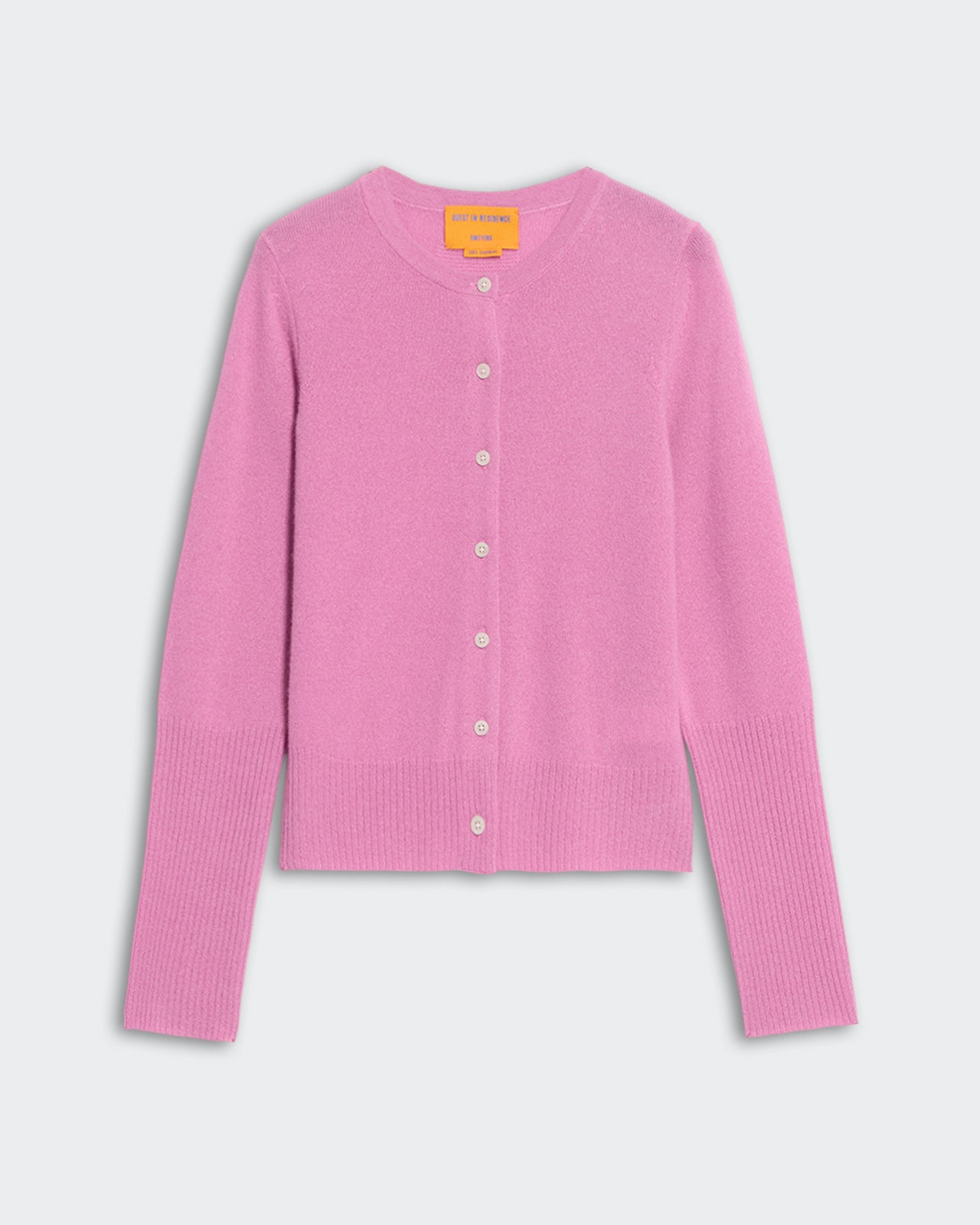 Light-weight rose pink cashmere cardigan with rib hem and cuff, button front closure, and tubular neck trim