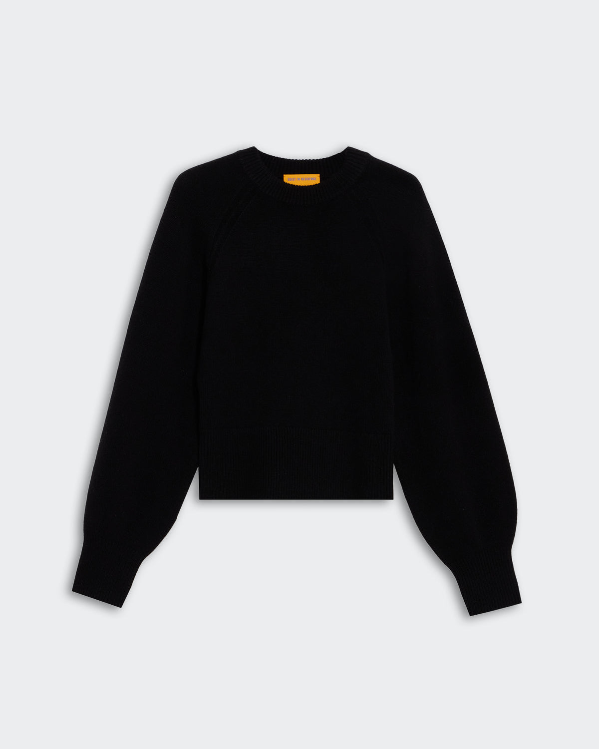 Sculpted Crew - Black women's cropped cashmere sweater with puffed raglan sleeves and cinched fit.