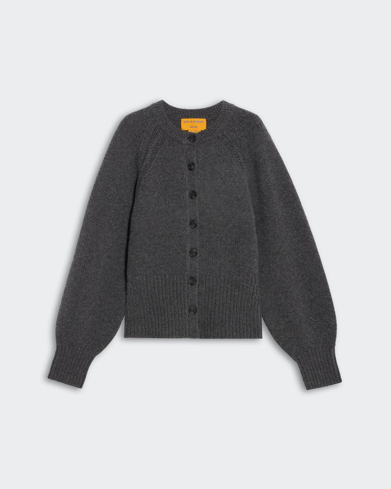 Sculpted Cardigan - Charcoal heavy-weight cropped cashmere with puffed raglan sleeves and front button closure.