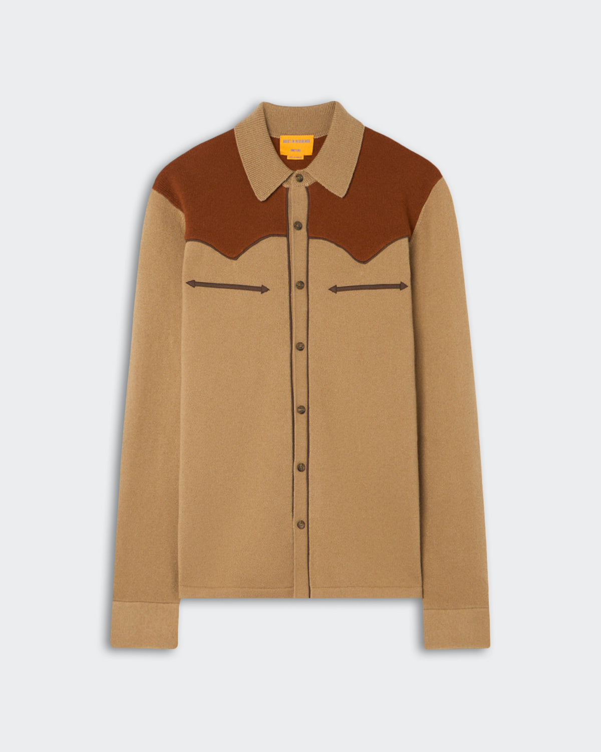 Beige and brown long-sleeve button-up shirt with a pointed collar and decorative arrow-shaped stitching on the chest pockets against a plain background.