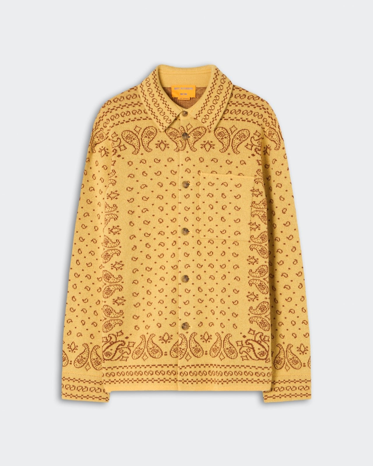 Yellow long-sleeve button-up shirt featuring an intricate paisley and dotted pattern throughout with a chest pocket and a classic collar.