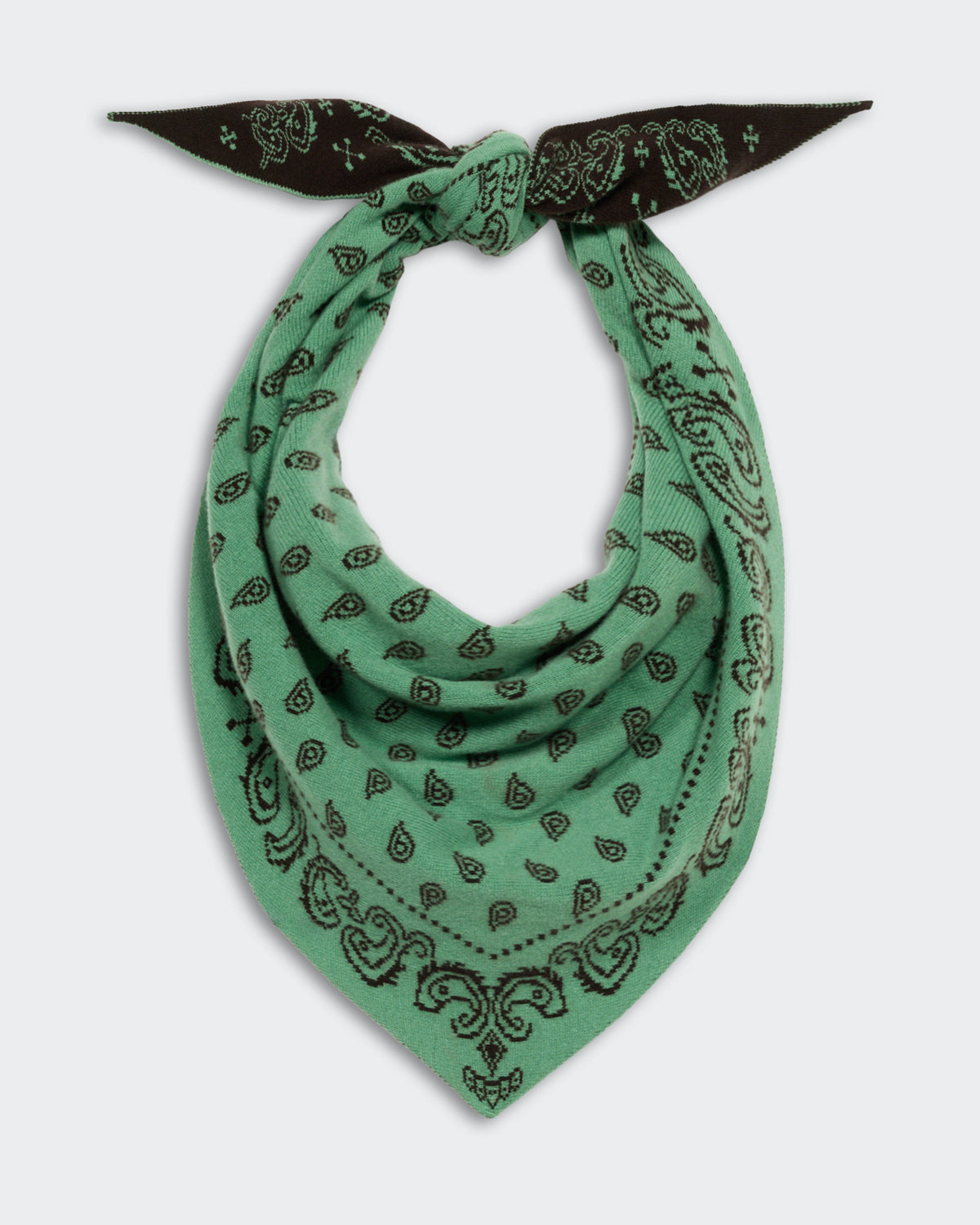 The Wild Rag - Highland/Burnt Cocoa cashmere scarf in green with black paisley pattern, styled with a knot and showcasing a soft, luxurious texture.