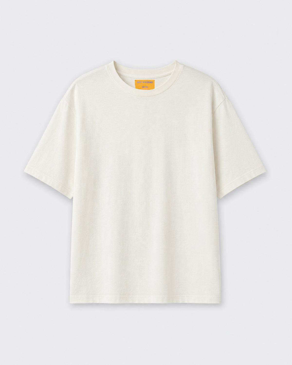 Oversized Tee - Cream laid flat on a light background with a relaxed fit short sleeves crew neck and clean minimal design